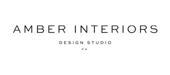 The logo reads "AMBER INTERIORS" in a clean, modern black font, with "DESIGN STUDIO" and "CA." in smaller text below it.