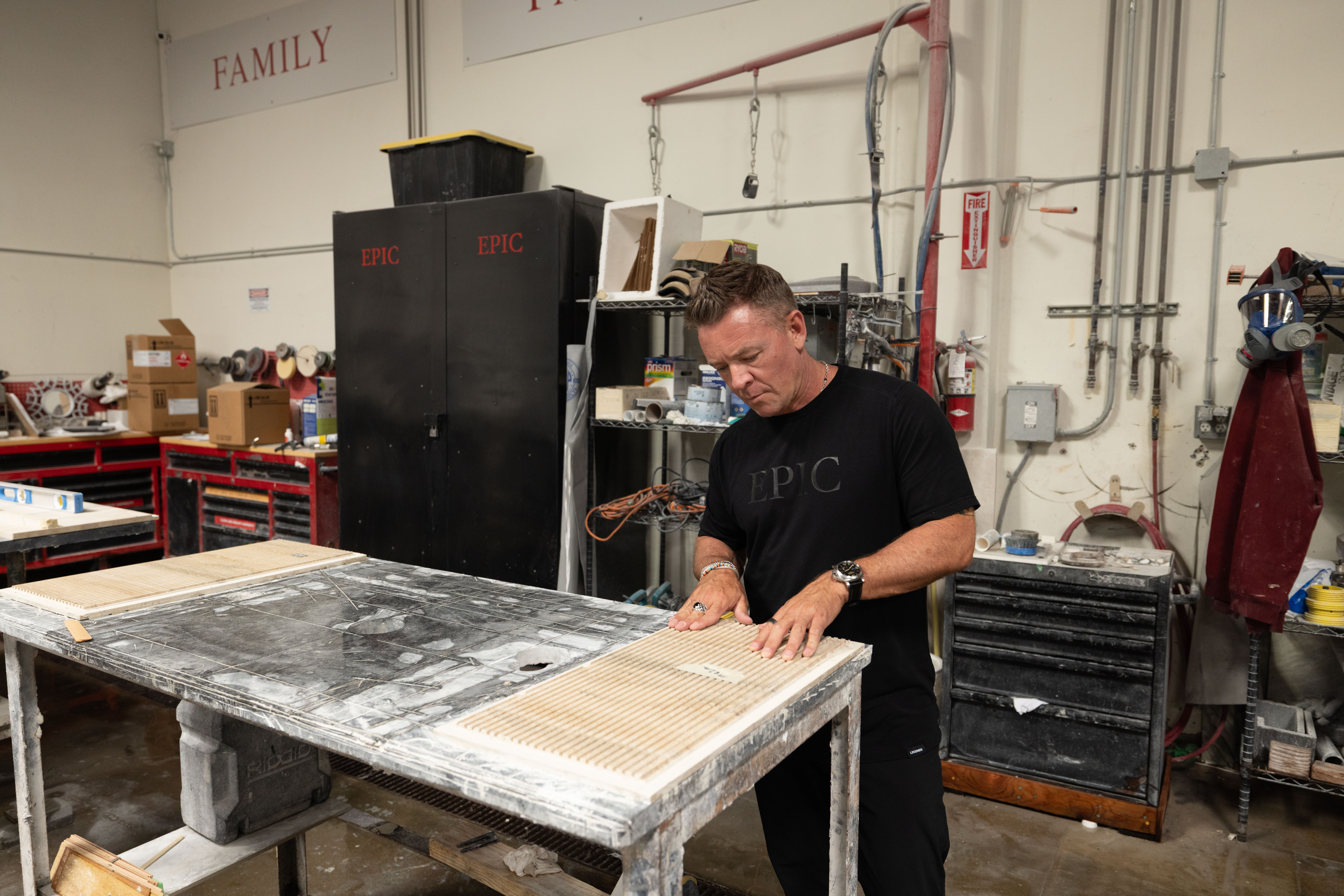 Josiah Lilly reviewing stone material selection