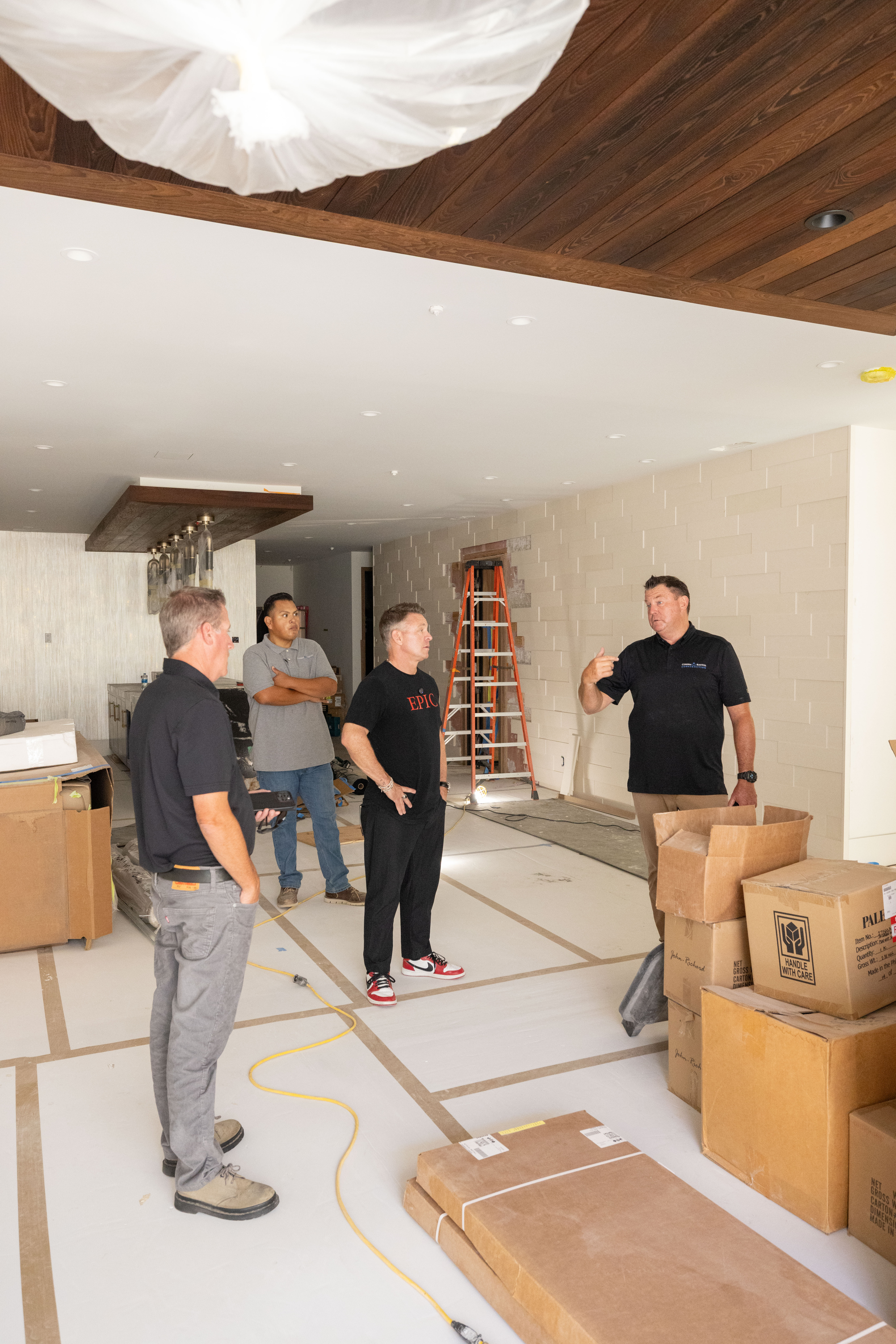 Josiah Lilly reviewing an Epic Ceramic & Stone job site